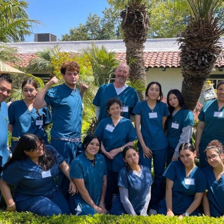 Students and staff outside Victoria Care Center